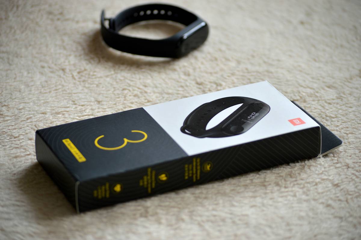 outdoor tech investment news: close-up of a wrist-worn altimeter watch displaying elevation data during a mountain hike